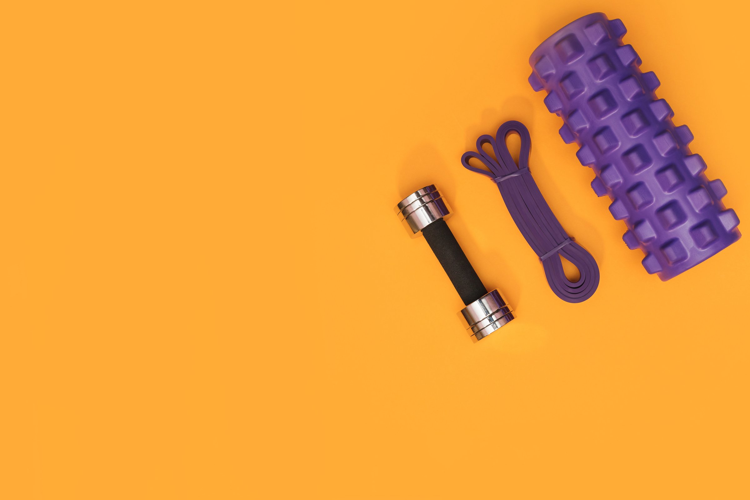 Massage Roller, Dumbbell  and Sports Leash Flat Lay